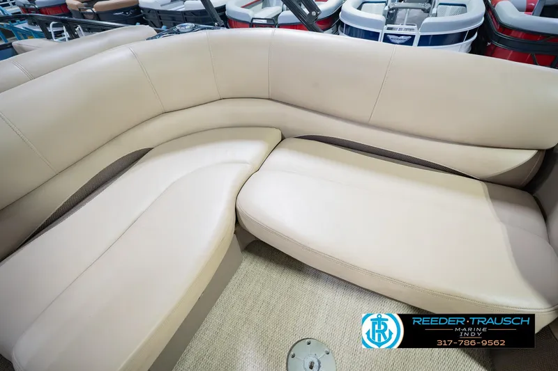 Slide: The Image of Luxurious seating on 2018 Regency 254 DL3 pontoon boat, featuring beige upholstery. - 49
