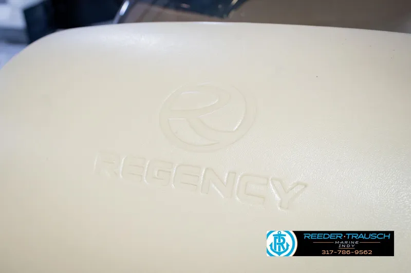 Slide: The Image of Close-up of 2018 Regency 254 DL3 boat seat with embossed logo. - 51