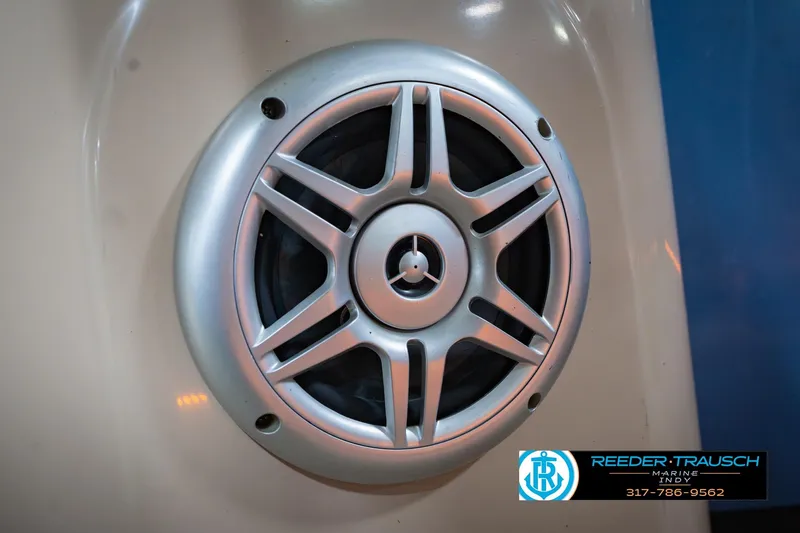 Slide: The Image of Silver speaker on a 2018 Regency 254 DL3 boat, Reeder Trausch Marine logo visible. - 53