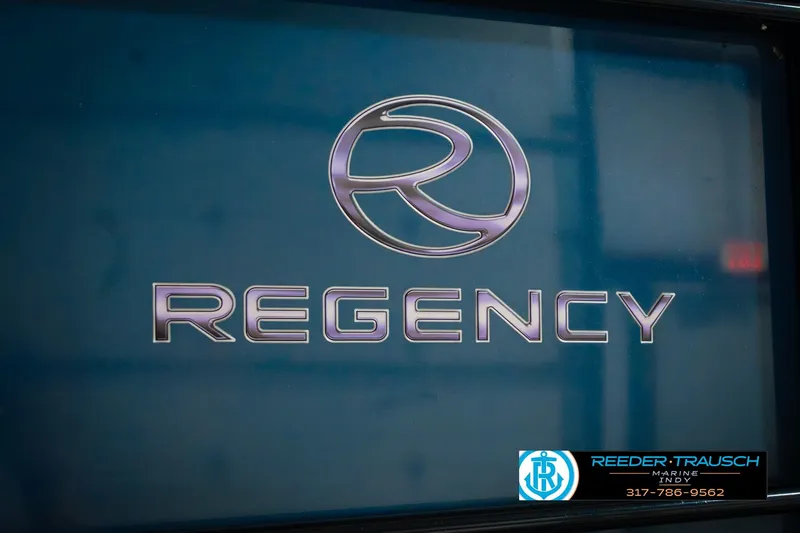 Slide: The Image of Regency 254 DL3 2018 logo with Reeder-Trausch Marine contact details. - 61