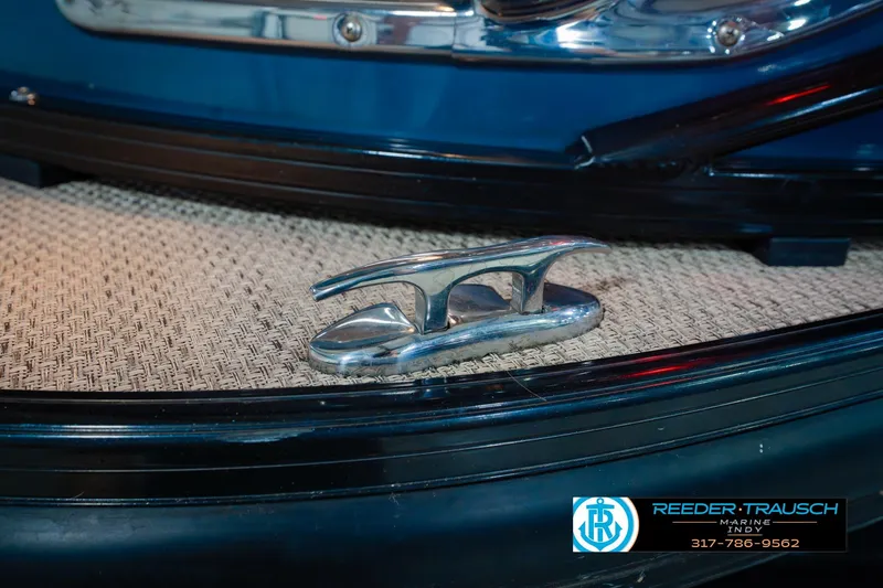 Slide: The Image of Chrome cleat on 2018 Regency 254 DL3 boat deck, Reeder-Trausch Marine logo visible. - 67