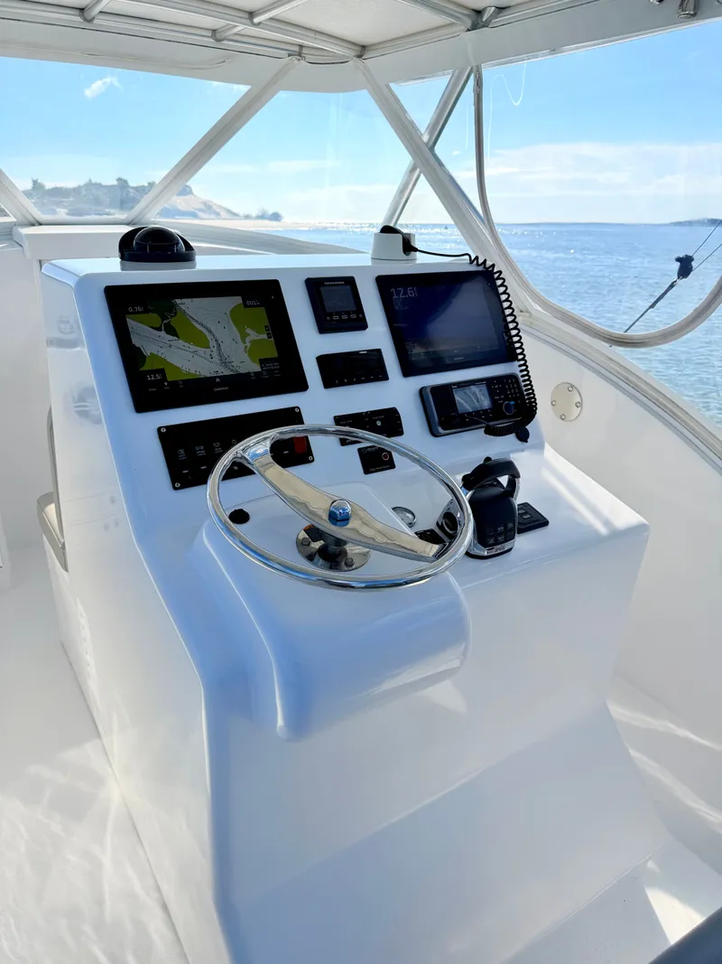 Slide: The Image of Helm console of a 1973 Custom Carolina 27 National boat. - 15