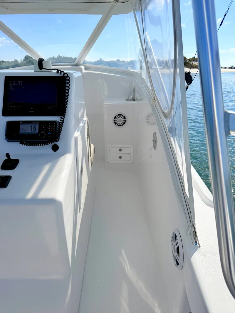 Slide: The Image of Interior view of a 1973 Custom Carolina 27 National boat. - 19