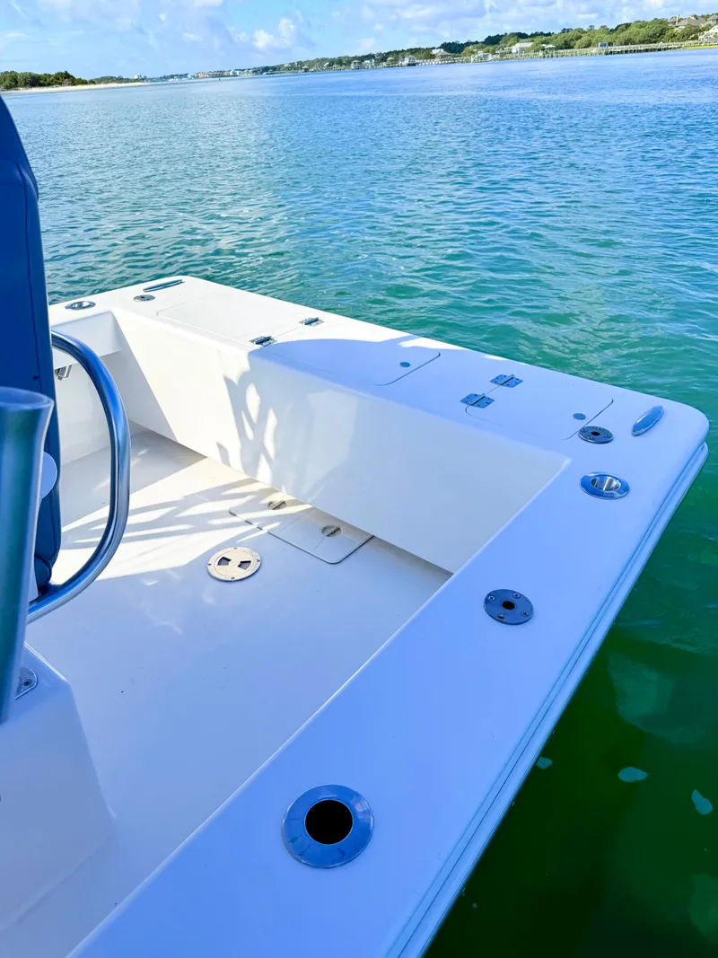 Slide: The Image of Custom Carolina 27 National boat from 1973 on calm waters. - 40