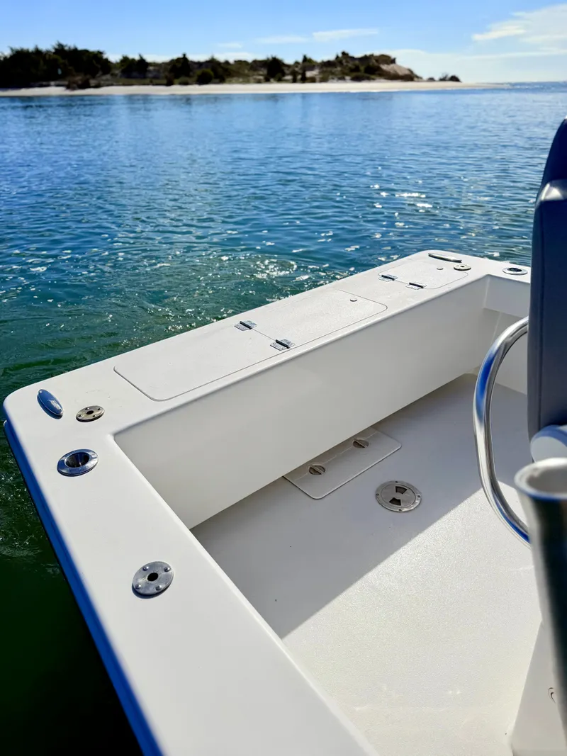Slide: The Image of Custom Carolina 27 National boat from 1973 on calm waters. - 41