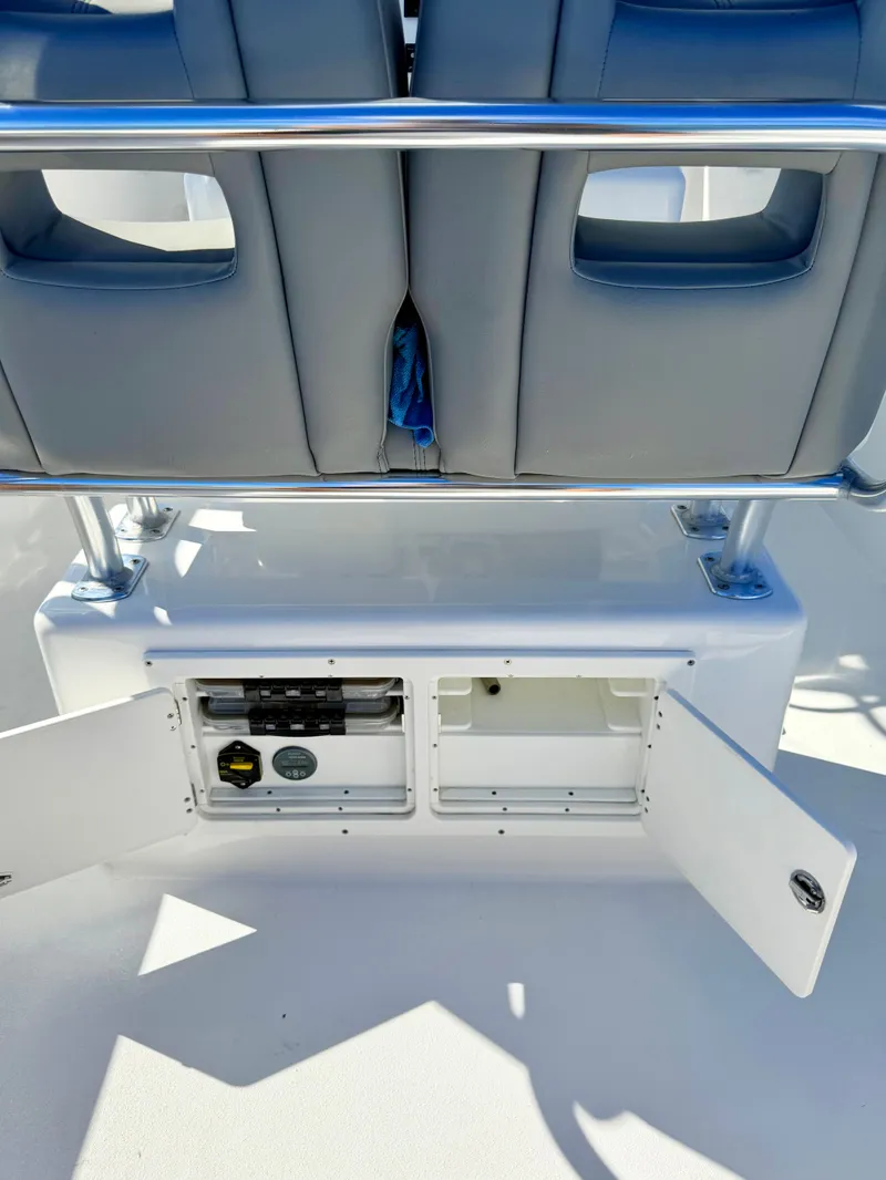 Slide: The Image of 1973 Custom Carolina 27 National boat with storage and seating. - 49