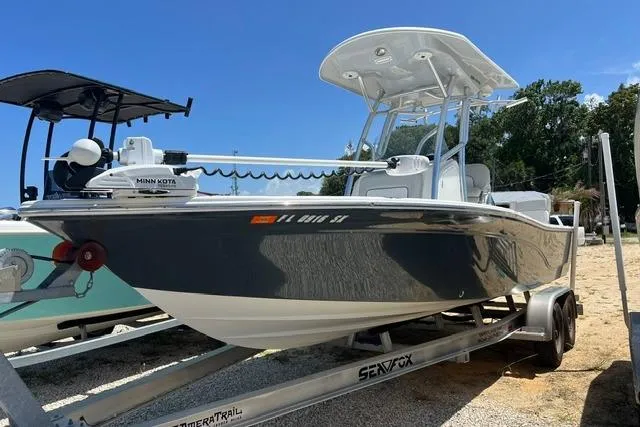 The Image of 2021 Sea Fox 220 Viper boat on trailer, featuring sleek design and modern equipment. - 0