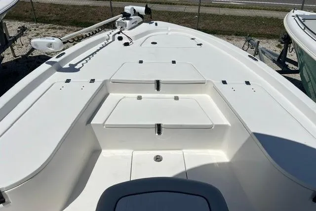 Slide: The Image of 2021 Sea Fox 220 Viper boat deck with storage compartments and trolling motor. - 10