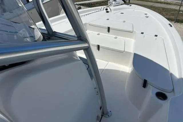 Slide: The Image of 2021 Sea Fox 220 Viper boat deck with seating and storage compartments. - 11