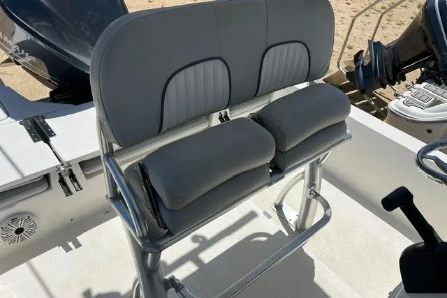 Slide: The Image of 2021 Sea Fox 220 Viper boat seat with gray cushions and sturdy metal frame. - 4
