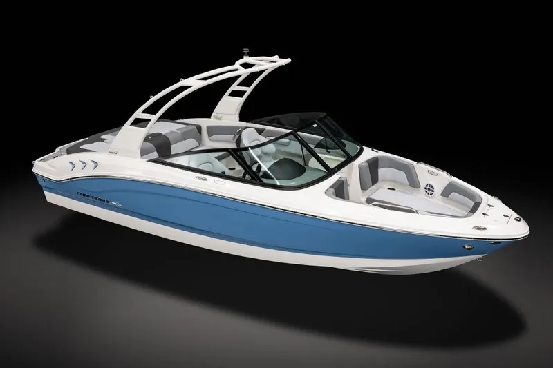 Slide: The Image of Manufacturer Provided Image: 2026 Chaparral 21 SSi boat with sleek blue and white design, modern features. - 10