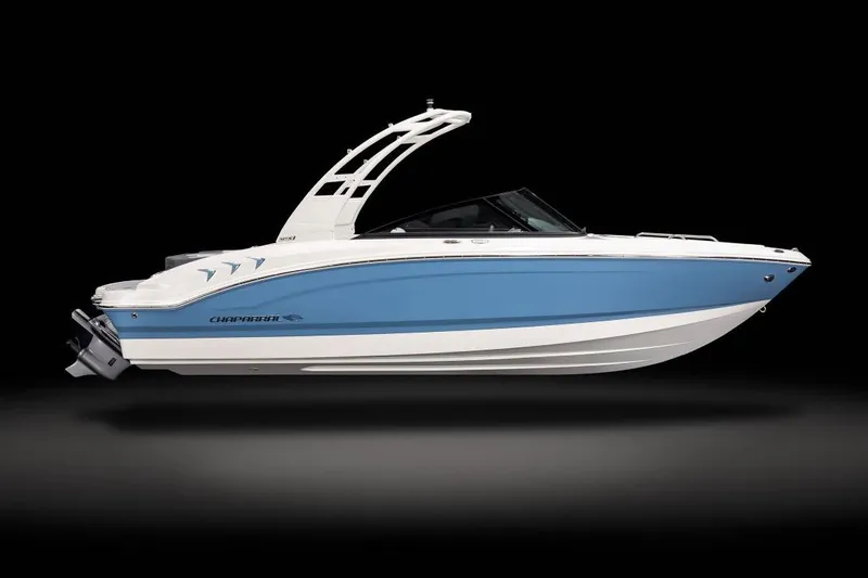 Slide: The Image of Manufacturer Provided Image: 2026 Chaparral 21 SSi boat, blue and white design, side view on black background. - 9
