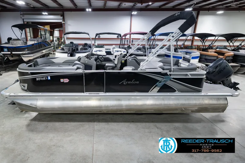 The Image of 2025 Avalon 2385 LSZ ENT pontoon boat in showroom, side view. - 0