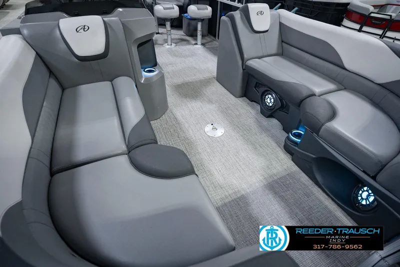 Slide: The Image of Interior of 2025 Avalon 2385 LSZ ENT pontoon boat with gray seating and cup holders. - 14