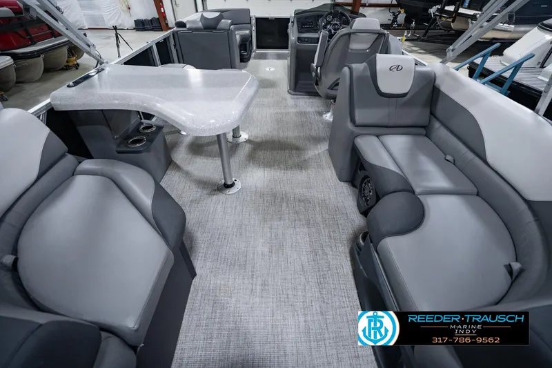 Slide: The Image of Interior of 2025 Avalon 2385 LSZ ENT pontoon boat with gray seating and table. - 22