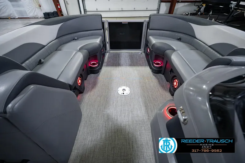 Slide: The Image of Luxurious interior of 2025 Avalon 2385 LSZ ENT pontoon boat with ambient lighting. - 25