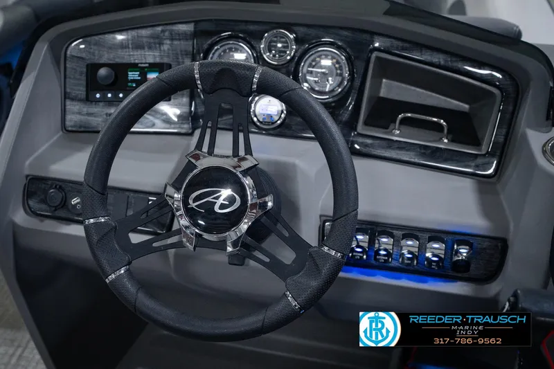 Slide: The Image of Steering wheel and dashboard of 2025 Avalon 2385 LSZ ENT boat. - 35