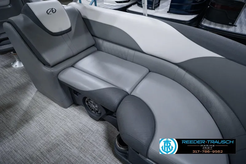 Slide: The Image of Luxurious seating in 2025 Avalon 2385 LSZ ENT pontoon boat, featuring sleek gray upholstery. - 46