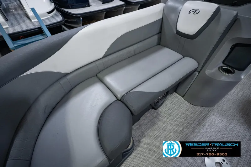 Slide: The Image of 2025 Avalon 2385 LSZ ENT boat interior with gray seating and modern design. - 47