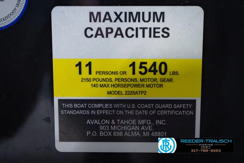 Slide: The Image of 2025 Avalon 2385 LSZ ENT boat capacity label, 11 persons or 1540 lbs, USCG compliant. - 61