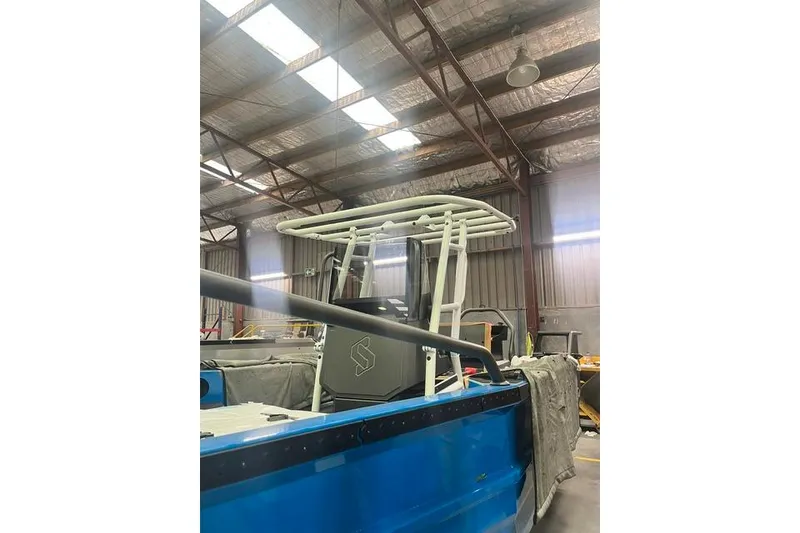 Slide: The Image of 2026 Stabicraft 2050 Frontier boat in a warehouse, showcasing its sturdy design. - 3