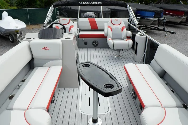 Slide: The Image of 2026 SunCatcher Select 322SL pontoon boat interior with stylish seating and modern design. - 11