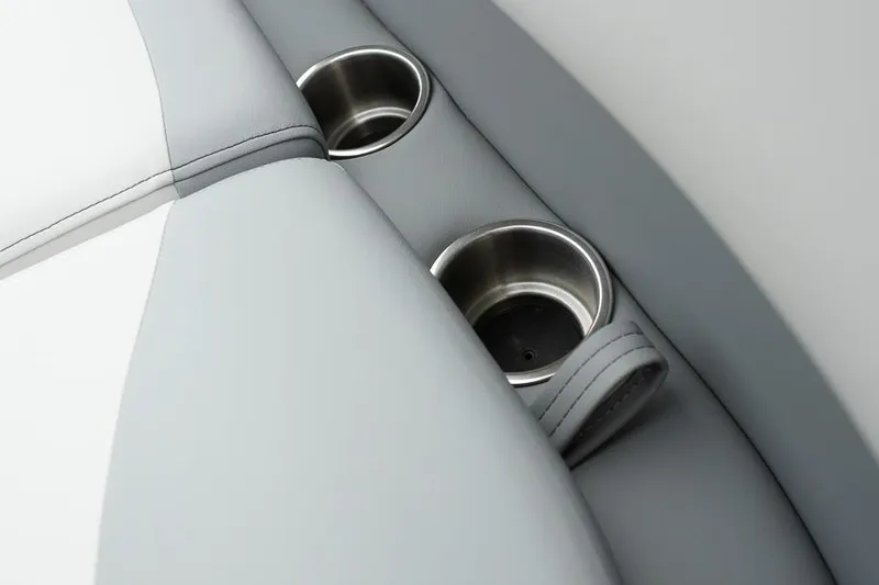 Slide: The Image of Gray and white leather seats with cup holders in 2026 SunCatcher Select 322SL. - 14