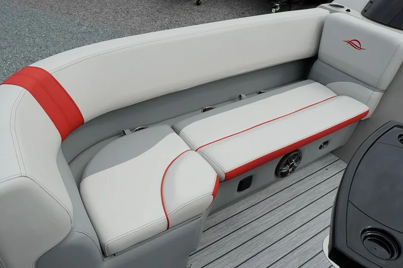 Slide: The Image of Luxurious seating on 2026 SunCatcher Select 322SL boat with red accents and sleek design. - 15