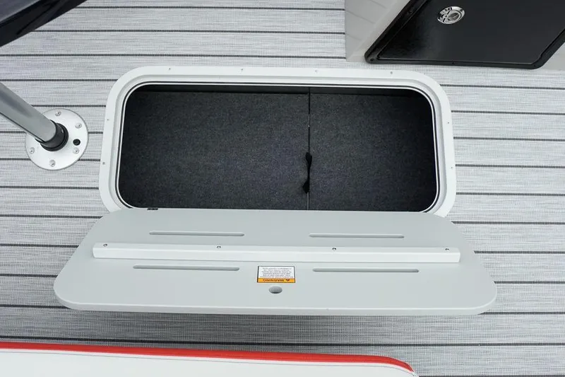 Slide: The Image of Open storage compartment on 2026 SunCatcher Select 322SL boat deck. - 21