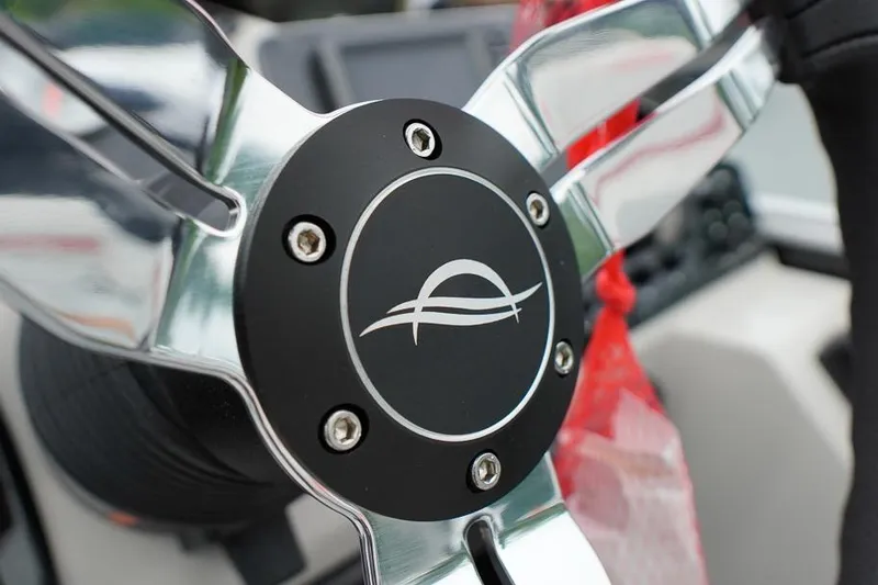 Slide: The Image of Close-up of SunCatcher Select 322SL 2026 steering wheel with logo detail. - 22