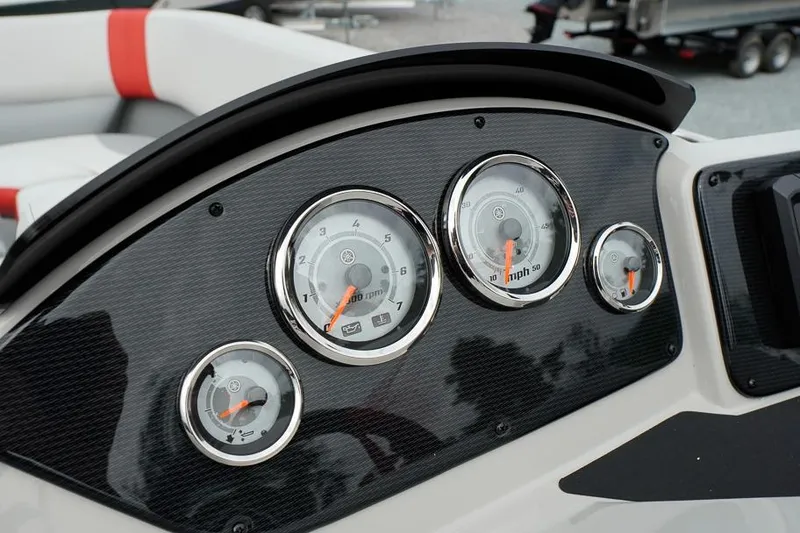 Slide: The Image of Dashboard of 2026 SunCatcher Select 322SL boat with speedometer and gauges. - 25