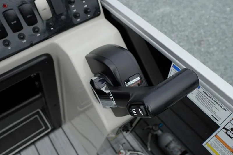 Slide: The Image of Control panel of 2026 SunCatcher Select 322SL boat with Yamaha throttle lever. - 29