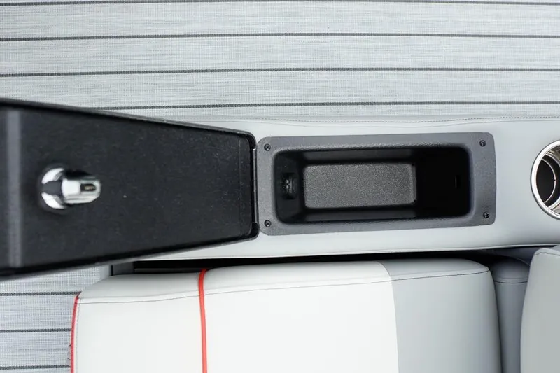 Slide: The Image of Interior of 2026 SunCatcher Select 322SL with storage compartment and cup holder. - 37