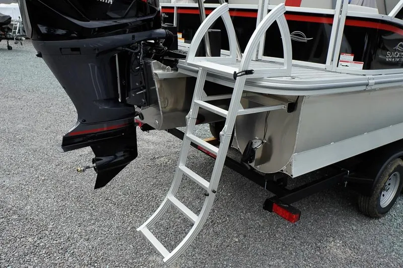 Slide: The Image of Rear view of 2026 SunCatcher Select 322SL boat with motor and boarding ladder. - 40