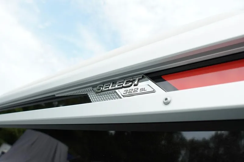 Slide: The Image of 2026 SunCatcher Select 322SL emblem on a sleek exterior design. - 9