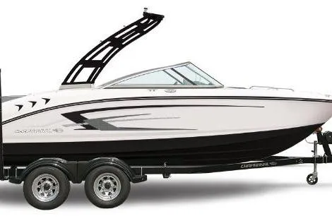 The Image of 2026 Chaparral 21 SSi boat on trailer, sleek design, black and white color scheme. - 0