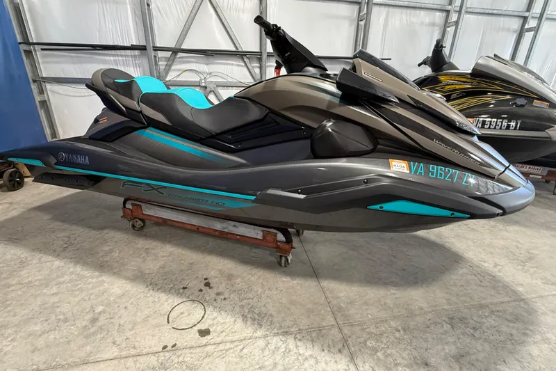 Slide: The Image of 2023 Yamaha WaveRunner FX Cruiser HO in a garage setting. - 11