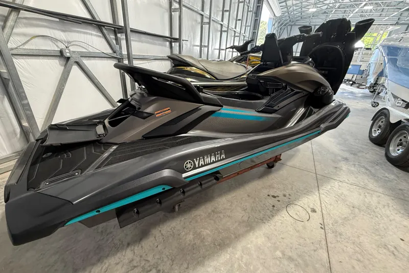 Slide: The Image of 2023 Yamaha WaveRunner FX Cruiser HO in a storage facility. - 12