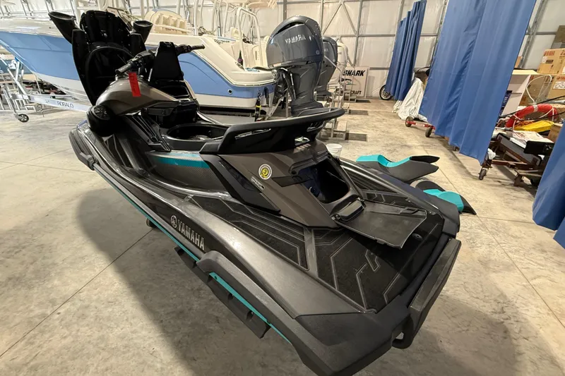 Slide: The Image of 2023 Yamaha WaveRunner FX Cruiser HO in a showroom, showcasing sleek design and features. - 13