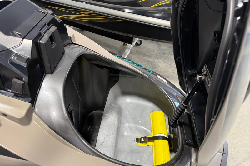 Slide: The Image of Open storage compartment of 2023 Yamaha WaveRunner FX Cruiser HO, showcasing interior space. - 14