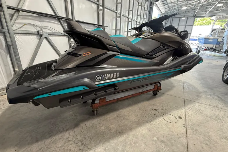 Slide: The Image of 2023 Yamaha WaveRunner FX Cruiser HO in a garage setting. - 7