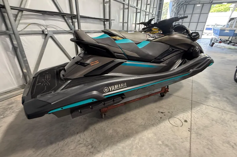 Slide: The Image of 2023 Yamaha WaveRunner FX Cruiser HO in a garage setting. - 8