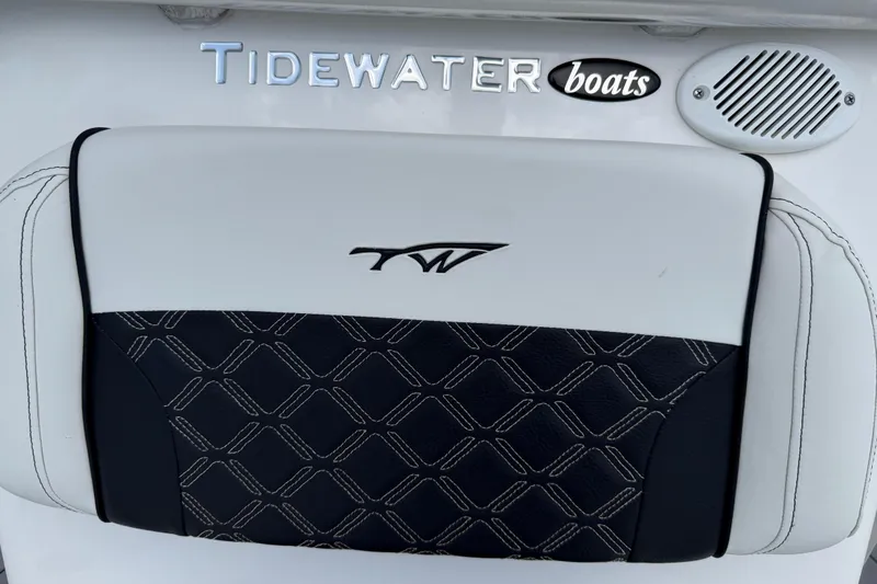Slide: The Image of 2023 Tidewater 198 CC Adventure boat seat with logo and speaker detail. - 103
