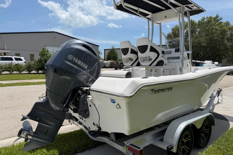 Slide: The Image of 2023 Tidewater 198 CC Adventure boat with Yamaha engine on trailer. - 13