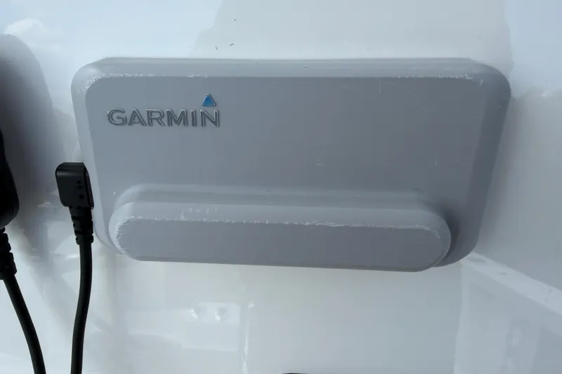 Slide: The Image of Garmin device on 2023 Tidewater 198 CC Adventure boat, featuring a connected cable. - 39