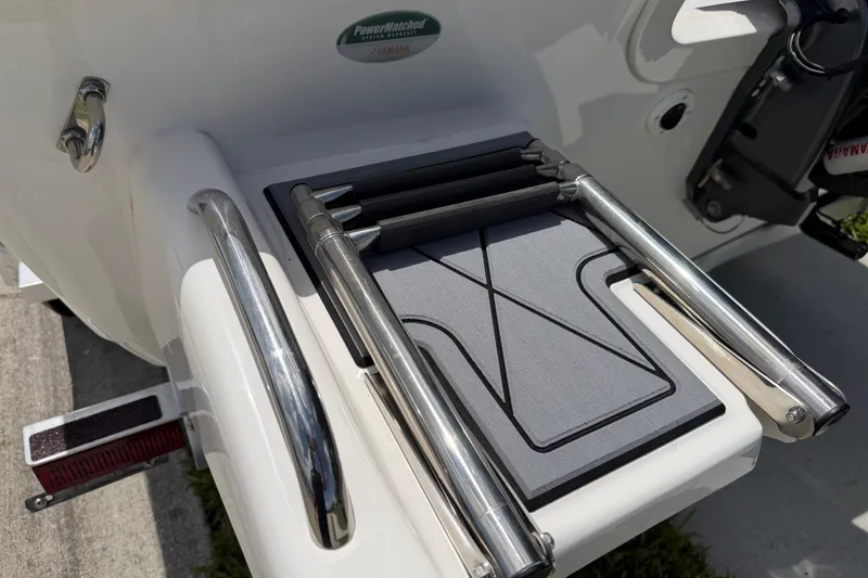 Slide: The Image of 2023 Tidewater 198 CC Adventure boat ladder and platform detail. - 4