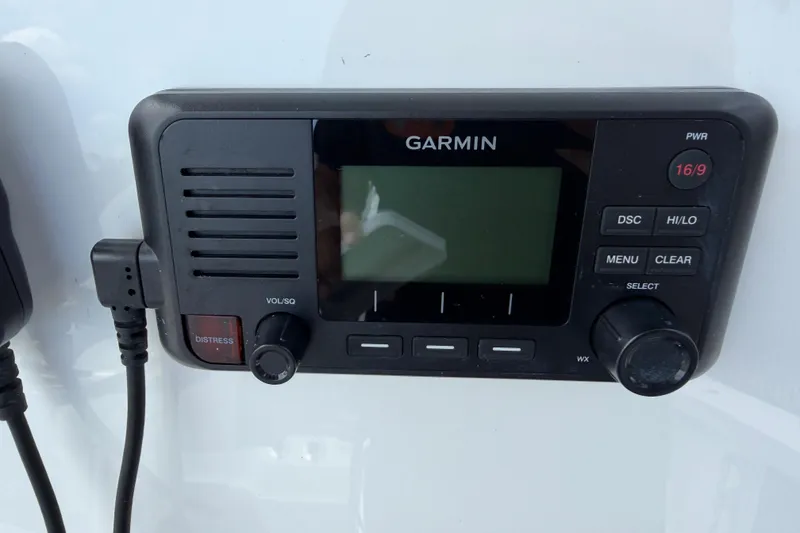 Slide: The Image of Garmin marine radio on 2023 Tidewater 198 CC Adventure boat dashboard. - 40