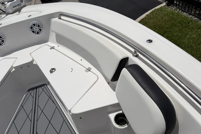 Slide: The Image of 2023 Tidewater 198 CC Adventure boat interior with seating and storage compartments. - 51