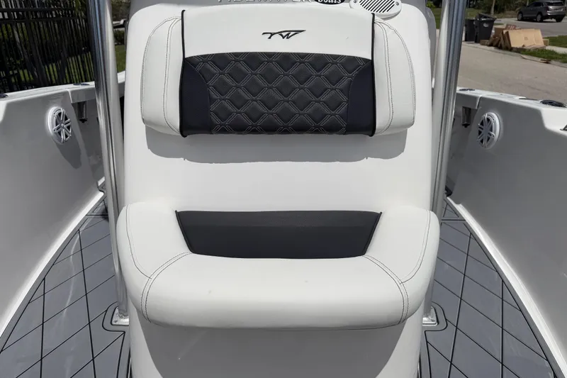 Slide: The Image of 2023 Tidewater 198 CC Adventure boat seat with stylish black and white upholstery. - 55