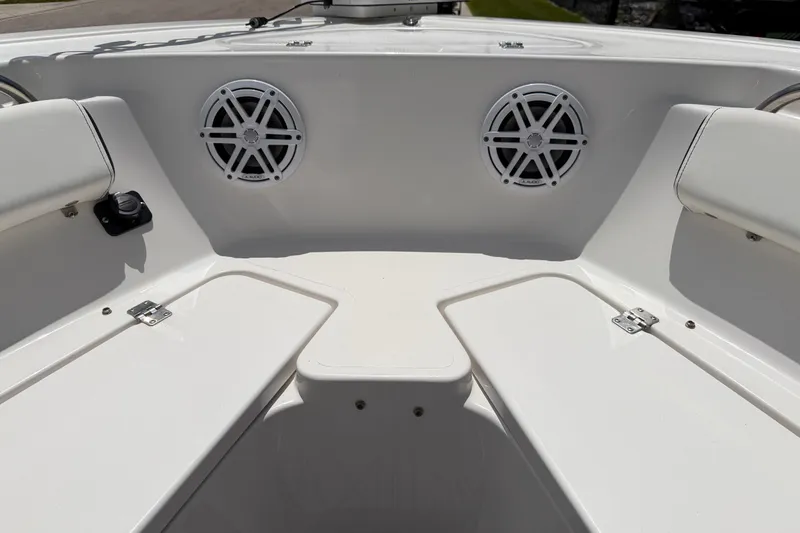Slide: The Image of 2023 Tidewater 198 CC Adventure boat interior with speakers and seating. - 59